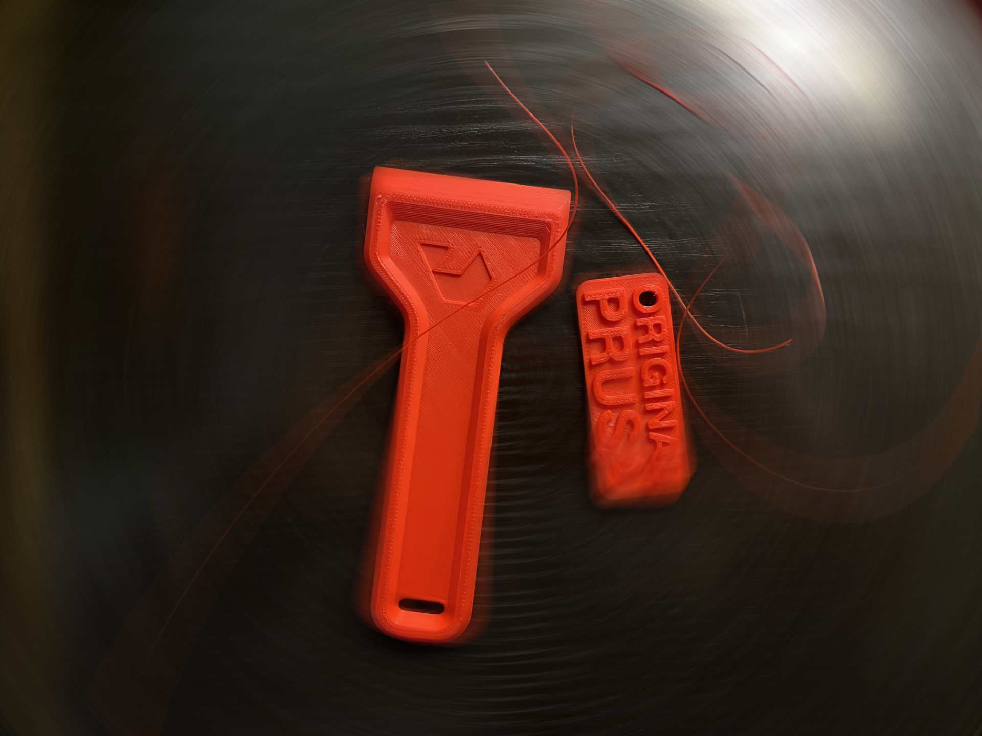 El llavero, la espátula y la alpaca